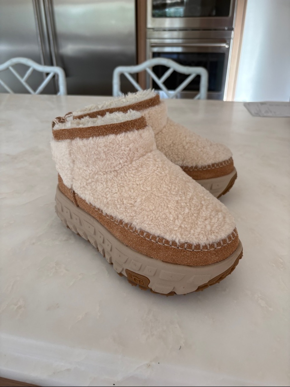 UGG Cream Shearling Platform Slip-Ons with Tan Suede Trim